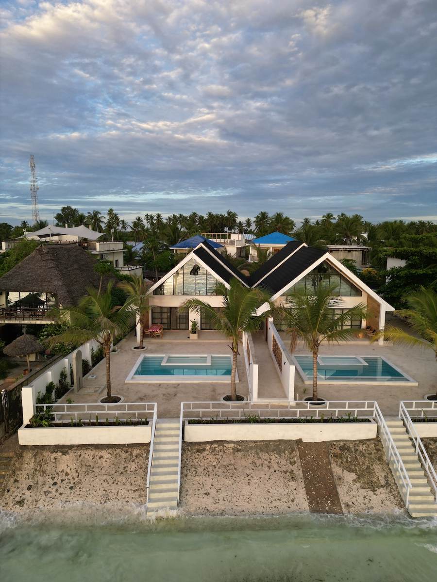 Aerial view of two villas and the beach