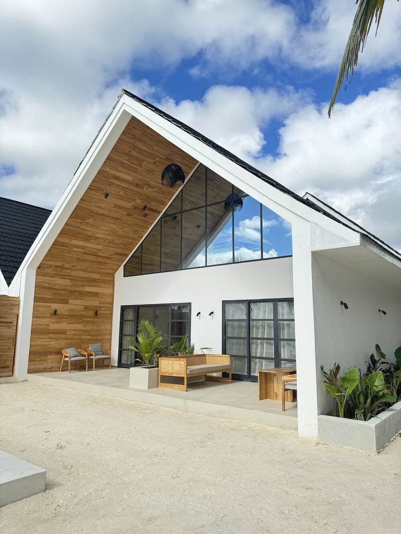 Villa 02, an A-frame beach villa with large windows